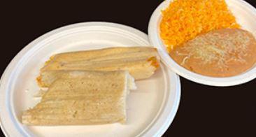 2 Tamales with side of rice and beans · 2 tamales your choice of meat pork or chicken with side rice and beans