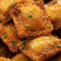 Fried Cheese Raviolis · 6 Pieces | Served W/ Marinara Dip 