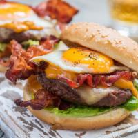 The Big T Burger (W/ French Fries)  · Fried Egg, Bacon, Ham, Cheddar Cheese, Onions & Chipotle Mayo