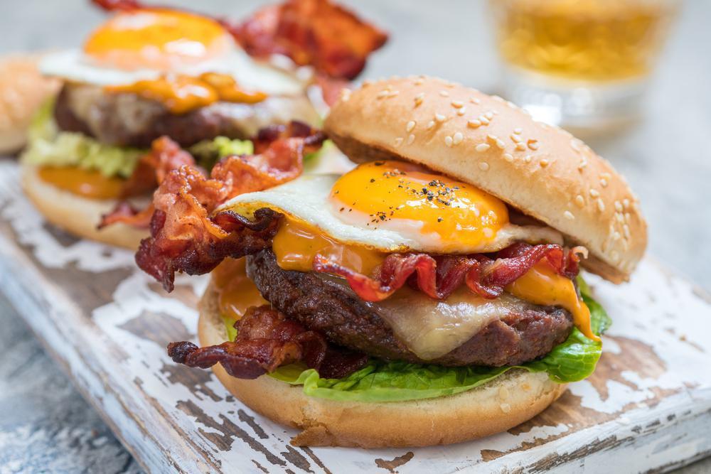 The Big T Burger (W/ French Fries)  · Fried Egg, Bacon, Ham, Cheddar Cheese, Onions & Chipotle Mayo