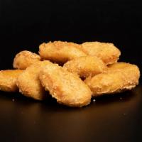 10 Piece Chicken Nuggets · Served with 1 Seasoning or 1 Sauce