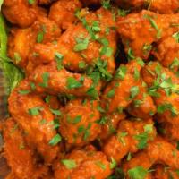 Buffalo Wings (8pcs.) · Dipped in our homemade mild sauce