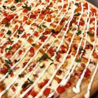 Cajun Chicken Pizza · Cajun chicken, bruschetta tomatoes, ranch dressing, and fresh mozzarella