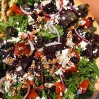 Greek Salad Pizza · Mix green salad, black olives, onions, tomatoes, feta cheese and balsamic vinegar