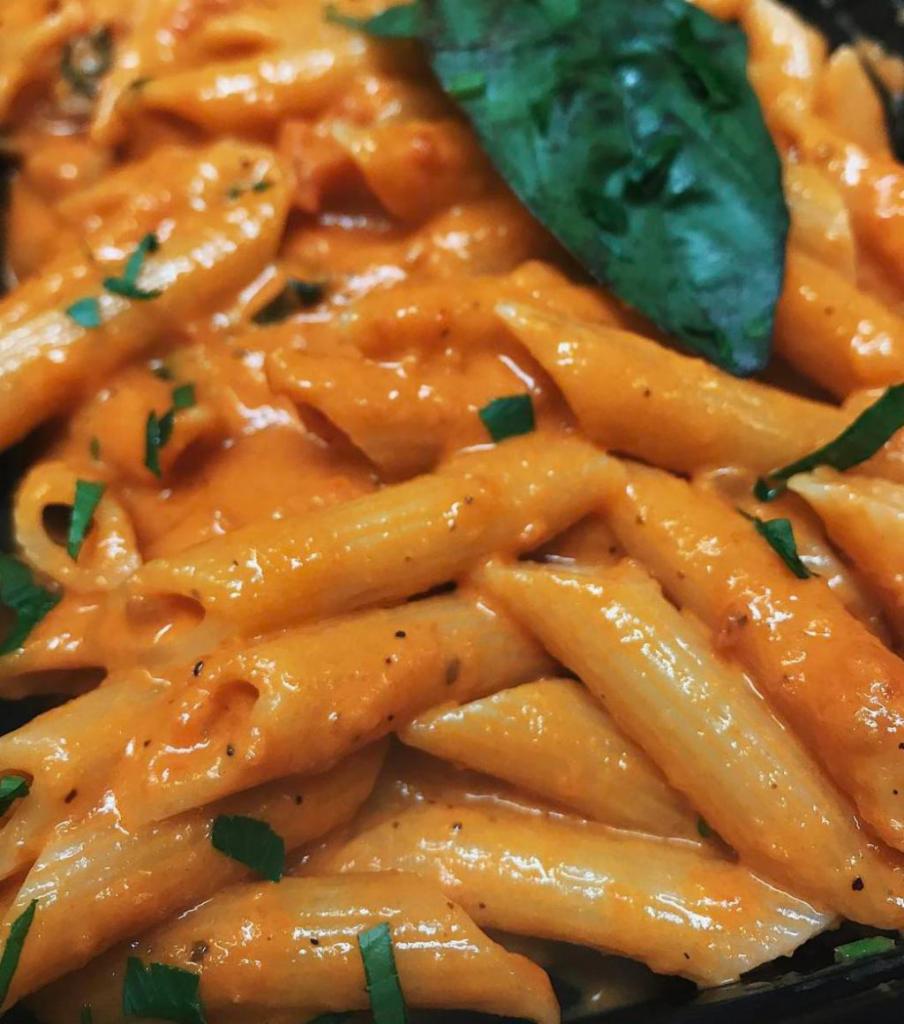 Penne Vodka · Served with your choice of mixed greens salad or Caesar salad.