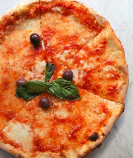 Margherita Pizza · San Marzano tomato, mozzarella and fresh basil and olives.