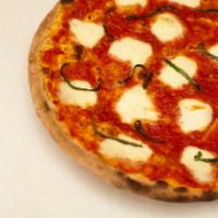 V.I.P. Margherita Pizza · Imported Italian fior di latte mozzarella, tomato and fresh basil.