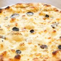 Tartufo Nero Pizza · Our secret recipe made from a bouquet of Italian cheeses and black truffle.
