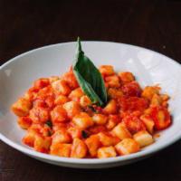 Gnocchi di Mamma · Homemade gnocchi, fresh cherry tomato sauce, Parmigiano Reggiano and basil. Traditionally ma...
