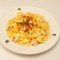 Farafalle al Limoncello · Bow tie pasta, shrimp, lemon zest, lemon juice and a touch of cream. Traditionally made like...