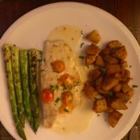 Branzino ai Cherry Tomatoes · Sauteed in white wine, served with cherry tomatoes, roasted potatoes and asparagus.