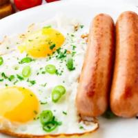 2 Eggs with Sausage · Fresh cooked eggs mixed with sausage on choice of bread.