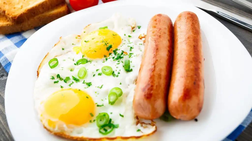 2 Eggs with Sausage · Fresh cooked eggs mixed with sausage on choice of bread.