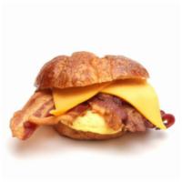 Bacon Egg Cheese Croissant · Fresh buttermilk croissants filled with eggs, bacon strips and choice of cheese.