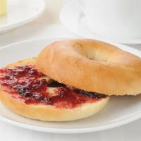 Bagel with Butter and Jelly · Warm bagel topped with butter and jelly.