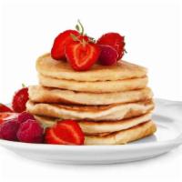 Strawberry Pancakes · 3 pieces of fluffy buttermilk pancakes with strawberry, and syrup.