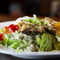 Cobb Salad · Mixed lettuce, grilled chicken, chopped bacon, blue cheese crumbles, green onions, avocado c...