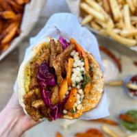 Vegan Pita Boxed Lunch · Includes Vegetable Based Shawarma Pita, (hummus, Israeli salad, red cabbage, lettuce, and ta...
