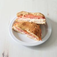 Bagel All the Way · Cream cheese, lox, tomato and onion.