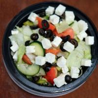 Greek Salad · Lettuce, tomato, feta cheese, red onions, olives and Greek dressing.