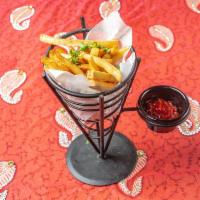 Masala Fries  · Crispy fries tossed in Indian spices. 