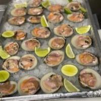Raw Clams · A dozen of Fresh Raw Clams serve with Fresh Limes.