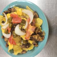 Nachos Special · Chili and cheese, jalapenos, sour cream, and picante sauce. 
*Add salad for an additional ch...