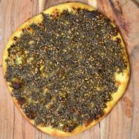 Zaater Manaqish · fresh baked flat bread crust, and Zaater (Thyme)