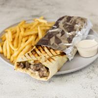 Beef Shawarma · Freshly cooked shredded beef marinated in iburger sauce, lettuce, tomatoes, onions, pickles,...
