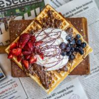Berry Bliss Waffle · Strawberries, blueberries, Nutella, whip cream.