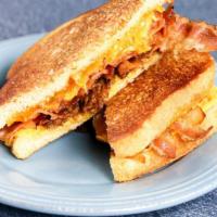 Grilled Cheese with Bacon Sandwich · Hot sandwich filled with cheese that has been pan cooked or grilled. Hot sandwich filled wit...