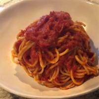 Spaghetti Pomodoro · Son Marzano tomato sauce and shaved Parmagiano Reggiano.  Vegetarian.