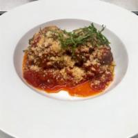 Homemade Meatballs · Beef, Parmesan, basil and fresh tomato sauce.