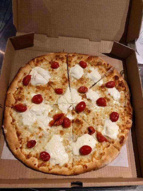 Pugliese Pizza · Shredded mozzarella, Burrata and cherry tomato.