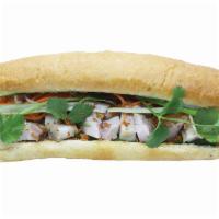 Banh Mi  Crispy Pork Belly Sandwich · Crispy pork belly sandwich. Crispy pork belly, cucumber, Viet coriander, cilantro, Heo Teo s...