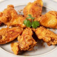 6 Spicy Honey Glazed Chicken Wings · Authentically sauce