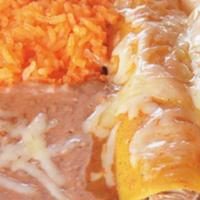 Enchilada Dinner · Cheese, shredded chicken or ground beef. 2 enchiladas topped with enchilada sauce and melted...