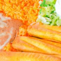 Flautas or Taquitos Mexicanos · 3 rolled tortillas stuffed with chicken, deep-fried to a golden brown. Served with rice, bea...