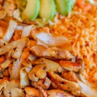 Pollo La Siesta · Seasoned chicken strips cooked on the grill with mushrooms and onions. Served with rice, let...