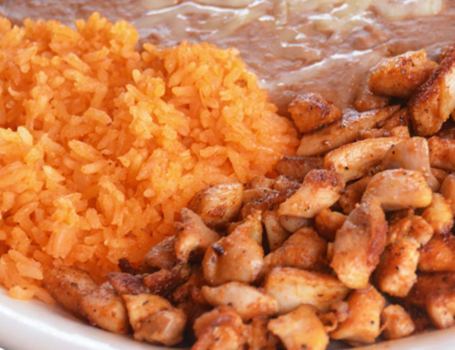 Pollo a la Diabla · Chicken pieces seasoned on the grill. Served with rice, refried beans, and tortillas.