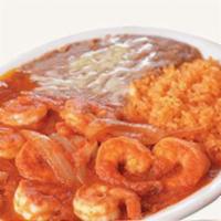 Camarones al Chipotle · Seasoned grilled shrimp sauteed with chile chipotle and onions. Served with rice and beans. ...
