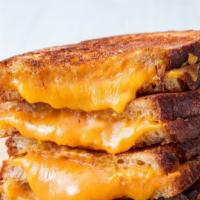 Grilled Cheese Sandwich · Hot sandwich filled with cheese that has been pan cooked or grilled. Hot sandwich filled wit...