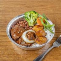 Beef Stew · Beef cassava stew served with rice, beans, mixed veggies, and fried plantains.