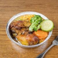 Roast Chicken · Roasted chicken served with yellow rice and mixed vegetables.