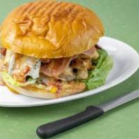 Max Burger · Homemade hamburger or grilled chicken, ham, bacon, mozzarella, egg, corn, lettuce, tomato, a...