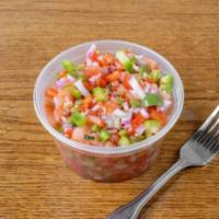 Vinaigrette Salad · A mild salsa that comes with tomato, onions, red, green peppers, olive oil, vinegar, and fre...