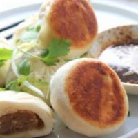 D5. Pan Fried Pork and Vegetable Buns · 3 pieces.
