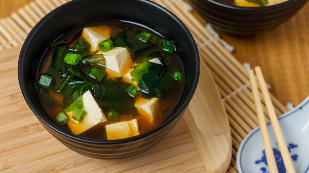 JA7. Miso Soup · Soybean base soup with tofu, seaweed, and green onions.