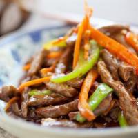 B2. Hunan Style Beef (Spicy) · Stir fried flank steak with broccoli, green peppers, onions, mushrooms, carrots, snow peas a...