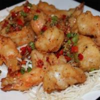 SE6. Large Spicy Salt and Pepper Shrimp (Spicy) · Jumbo shrimp dusted in potato starch and fried then stir fried with onions and peppers. Hot ...